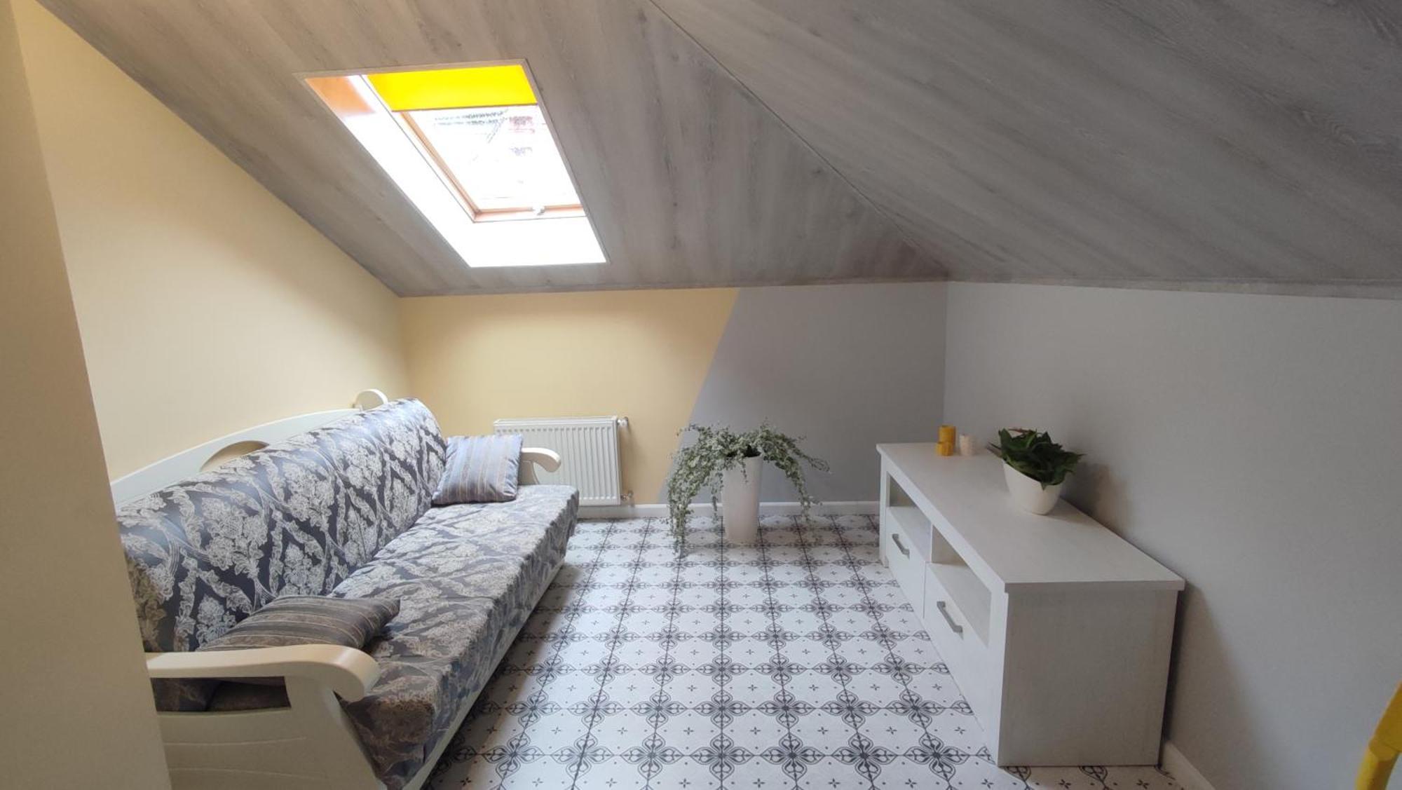 Appartement Сонячна Мансарда à Kamianets-Podilsky Extérieur photo