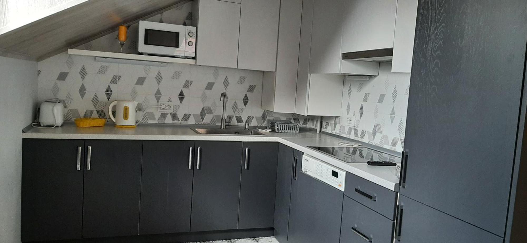 Appartement Сонячна Мансарда à Kamianets-Podilsky Extérieur photo