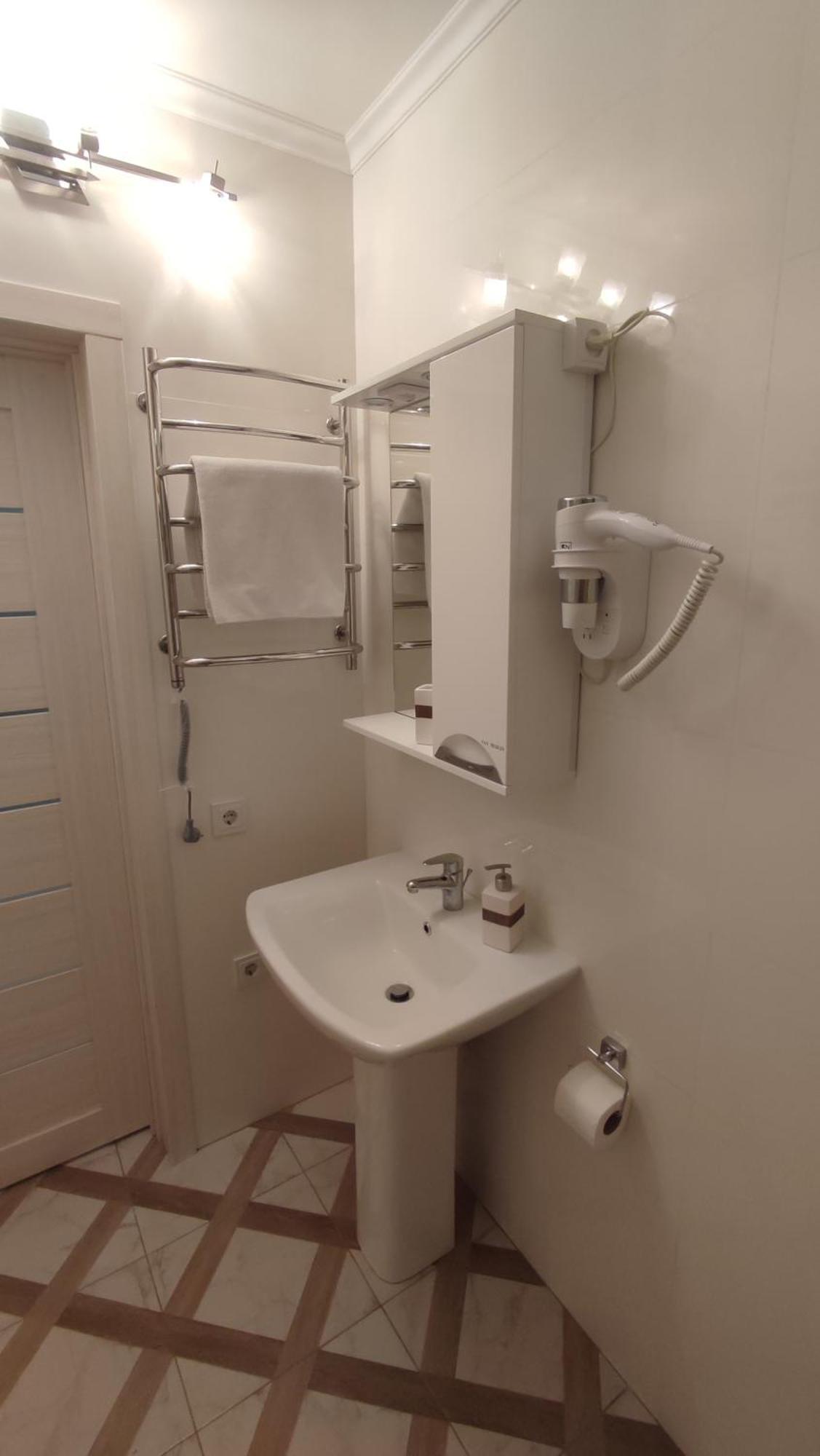 Appartement Сонячна Мансарда à Kamianets-Podilsky Extérieur photo